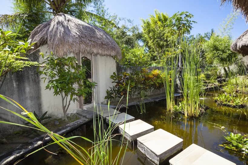 The exterior of the spa with a stone walk way The exterior of the spa with a stone walk way
