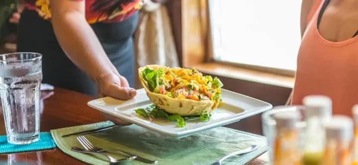 A meal is served at Turneffe Island Resort A meal is served at Turneffe Island Resort