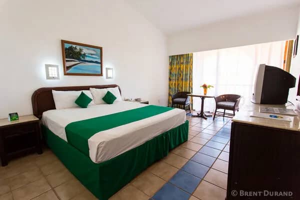 A bed in a hotel room. A bed in a hotel room.