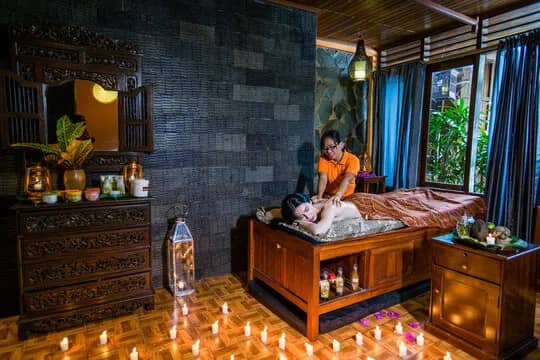 A woman receives a massage in the spa at Bastianos Dive Resort Bunaken A woman receives a massage in the spa at Bastianos Dive Resort Bunaken