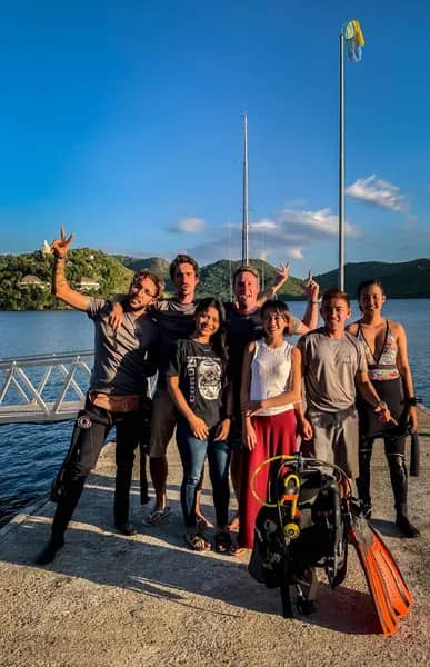 Happy guests and divers Happy guests and divers