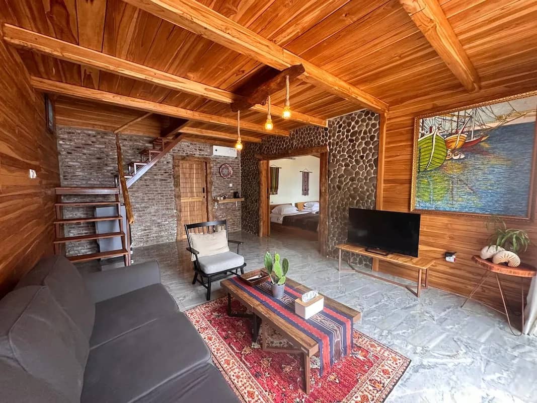 Downstairs living area with a couch and TV Downstairs living area with a couch and TV