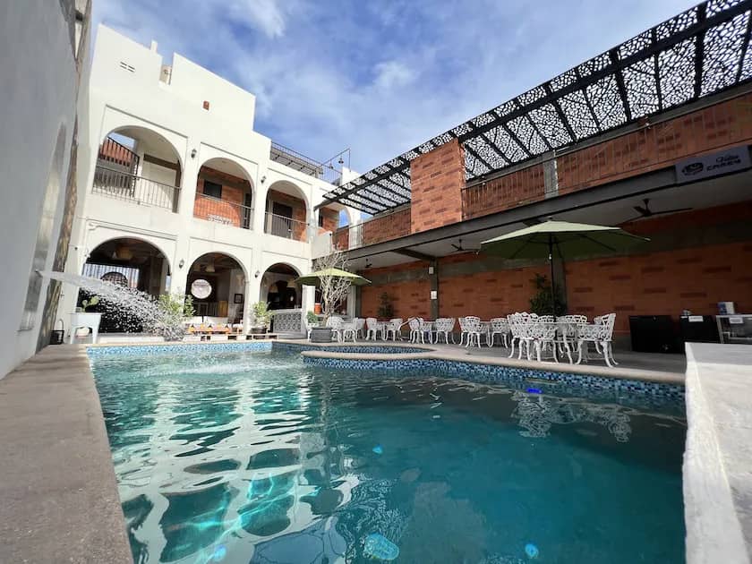 Swimming pool with building facade in the backgroun Swimming pool with building facade in the backgroun