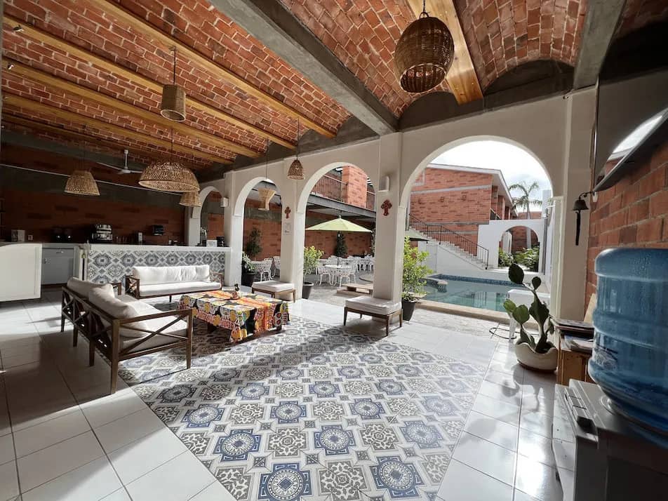 Buceo Carey lobby with couches and tables for guests Buceo Carey lobby with couches and tables for guests